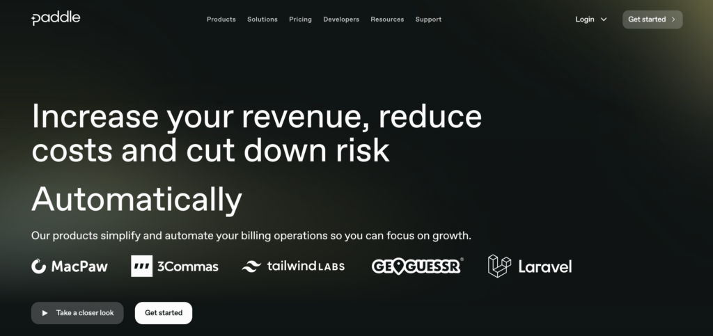 Screenshot of Stripe alternative Paddle's homepage, black with white text and yellow blurs with white customer logos.