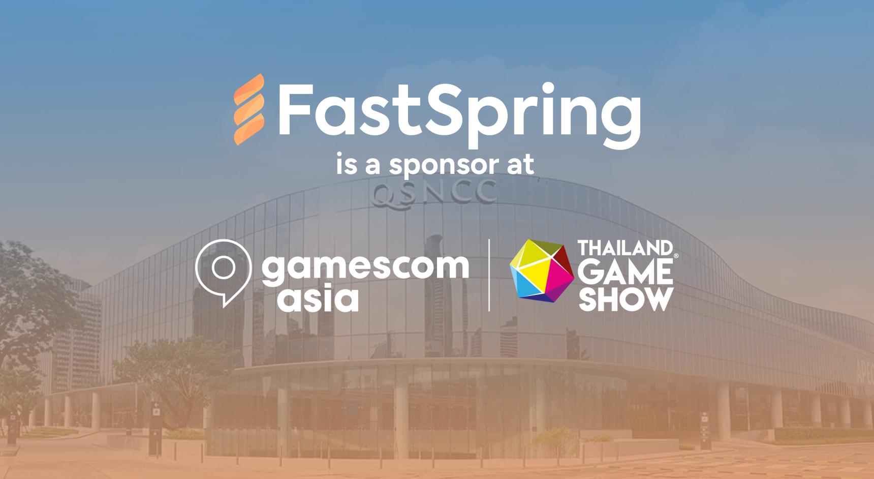 An orange and white FastSpring logo, with a white gamescom asia logo and a mostly white Thailand Game Show logo, both over a blue-to-orange gradient image of a mirror-windowed event venue.